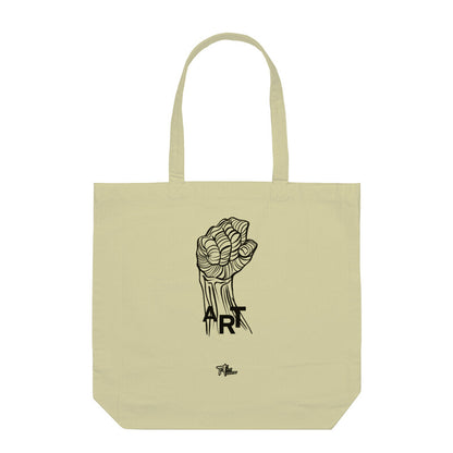 A beige cotton tote bag with a black handle and a black printed design of a fist and the word 'ART' on the front.