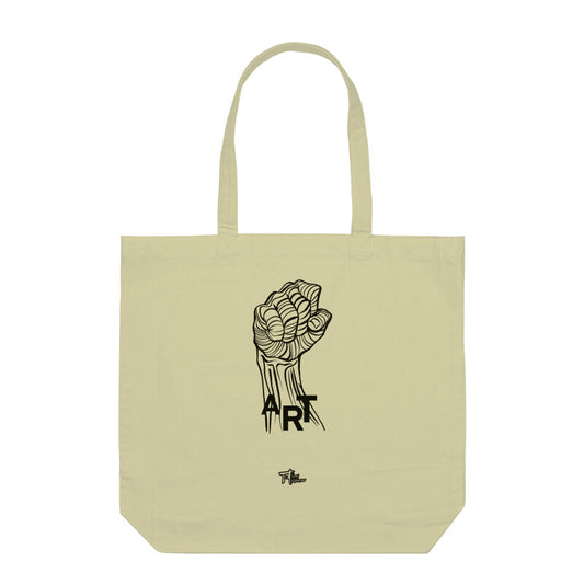 A beige cotton tote bag with a black handle and a black printed design of a fist and the word 'ART' on the front.