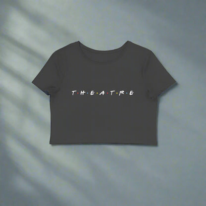 White crop top with the text 'T.H.E.A.T.R.E' printed in black on the front.